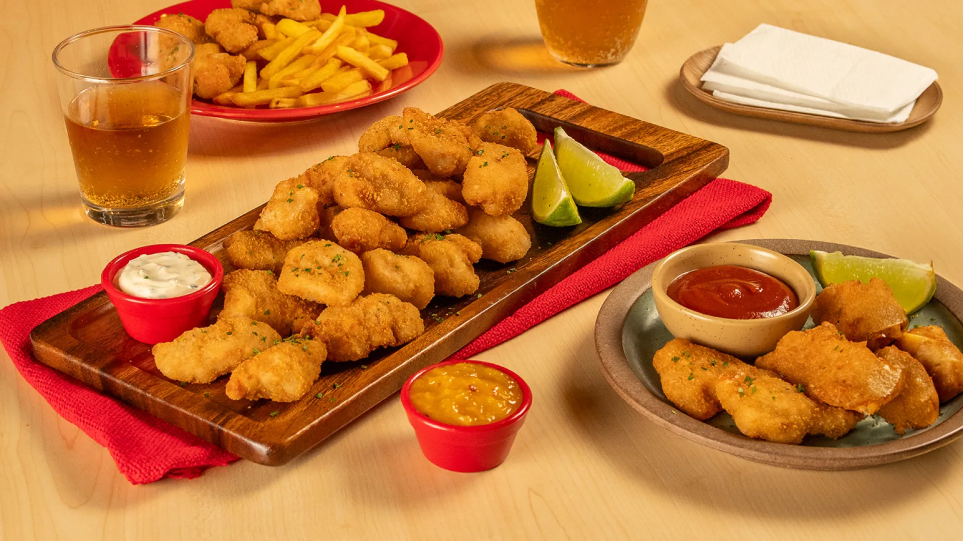 foto da receita Isca de Coxa e Sobrecoxa Empanado com Molhos