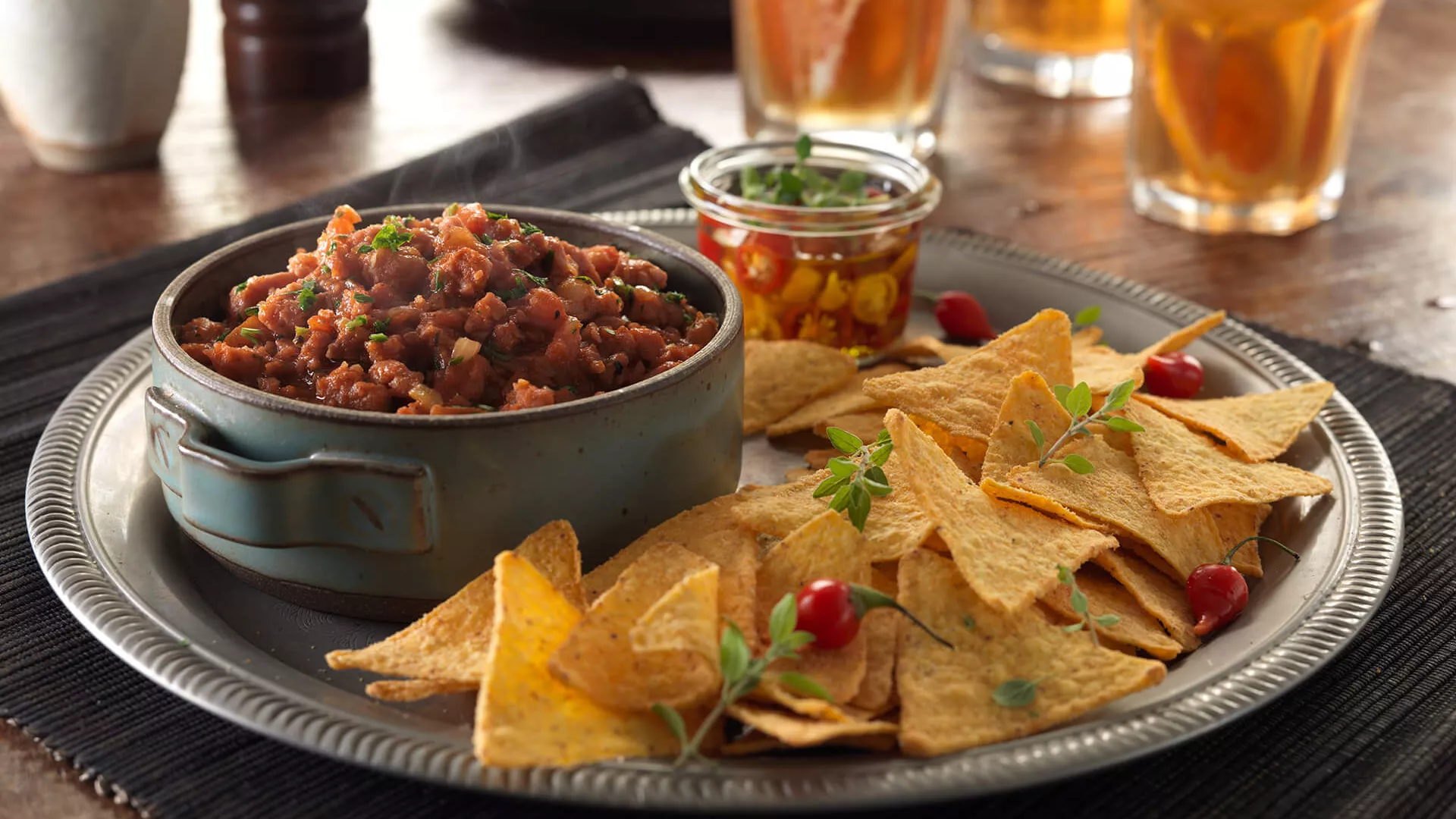 foto da receita Nachos com Ragu de Linguiça de Pernil